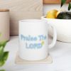 Praise The Lord ceramic mug on desk